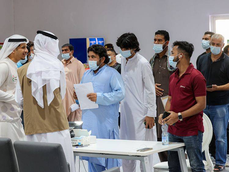 File photo: Amnesty applicants queue up at a GDRFA counter in Al Awir.